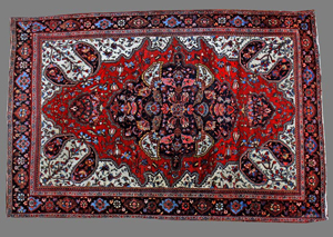 Extremely fine weaving went into this circa 1890 Feraghan Sarouk, which measures 4.03 feet by 6.05 feet. Some cracking is noted along the sides of this rare rug. It has a $10,000-$12,000 estimate. Image courtesy Kimball M. Sterling Inc.