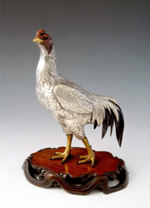 Among the works of art expected to be on sale at the inaugural Art Antiques London fair in Kensington Gardens in June will be this late Meiji period Japanese bronze cockerel with silvered body and details in shakudo and gilt, signed Shigemitsu, priced at £6,500 ($9,750) with Laura Bordignon. Image courtesy Houghton Fairs.