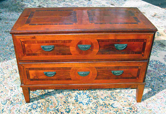 Cherry, mahogany, and rosewood veneer and inlay highlight this three-drawer commode, probably of Austrian or German origin. It has a $1,200-$1,800 estimate. Image courtesy Gordon S. Converse & Co.