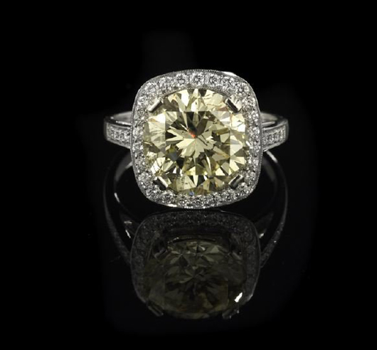 Featuring a natural fancy light-yellow diamond weighing 4.60 carats, this platinum ring has a $25,000-$40,000 estimate. Image courtesy New Orleans Auction Galleries Inc.