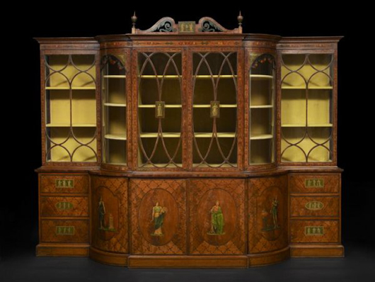 Roman goddesses Proserpina, Ceres, Juno and Fortuna are depicted on panels on this huge satinwood library case from the fourth quarter of the 19th century. Inspired by a Sheraton design, the nearly 10-foot-wide case has a $50,000-$80,000 estimate. Image courtesy New Orleans Auction Galleries Inc.