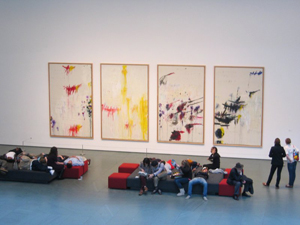 People "collapsed" at the Museum of Modern Art, New York, in front of the Cy Twombly series of paintings titled The Four Seasons: Spring, Summer, Autumn and Winter, 1993-94. Photo by Allie of Valence, France. Courtesy Wikipedia.