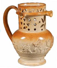 Try drinking from this pierced puzzle jug without getting wet (use the handle as a straw). The 19th-century stoneware jug sold for $356 at a Skinner auction in Boston.
