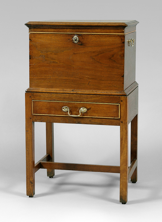 The sale’s top lot was this 36 inch by 20½ inch by 15¼ inch walnut North Carolina cellaret with single board top, line inlay, molded edge and light wood beading. Attributed to Micajah Wilkes of Roanoke River Basin, N.C., 1780-1795, it sold to an Atlanta collector for a record-breaking $165,200 (est. $40,000-$60,000). The cellaret was photographed for an article on Tom Gray’s home in The Magazine Antiques, December 1997.