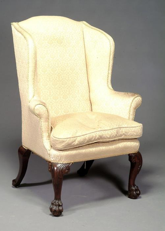 Possibly Irish, this George III mahogany wing armchair features acanthus carved cabriole legs on claw and ball feet and outswept rear legs. It has a $12,300-$18,400 estimate. Image courtesy Dreweatts.