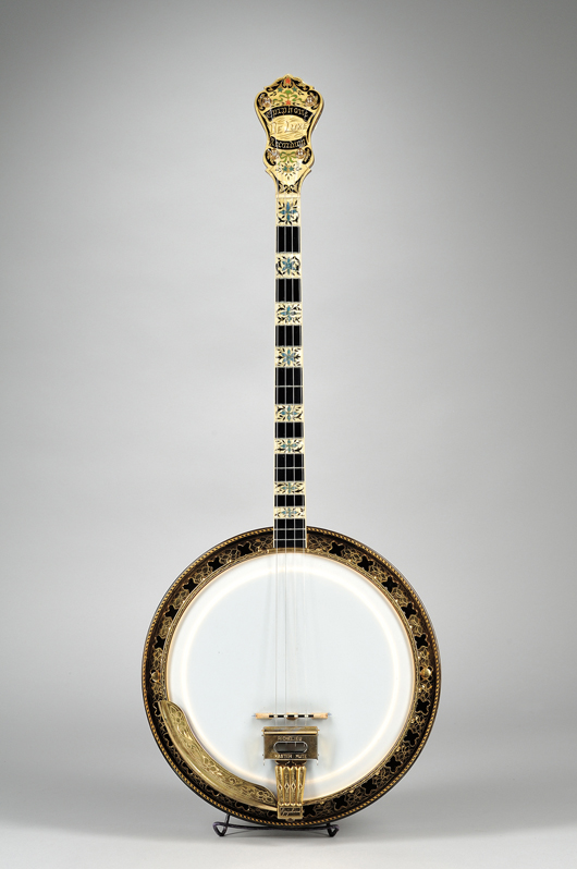American arch top tenor banjo, Epiphone Banjo Corp., New York, 1928, Model Deluxe Recording, estimate:$3,000-5,000. Image courtesy of Skinner Inc.
