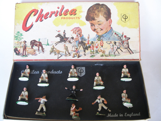 Cherilea England baseball set with nine-player team, umpire and original pictorial box. Old Toy Soldier Auctions image.