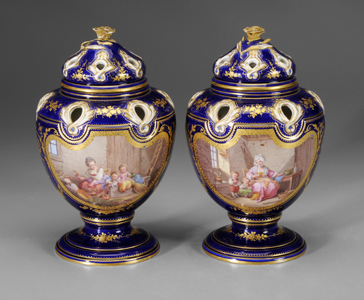 Seventeen pieces of Sèvres porcelain are in the May 1 sale. This pair of 9-3/8 inch lidded potpourris from a Maryland collection was chosen for the catalog cover. With pierced lids and shoulders and hand-painted scenes on both sides, the presale estimate on the jars is $1,000/$2,000. Brunk Auctions image.