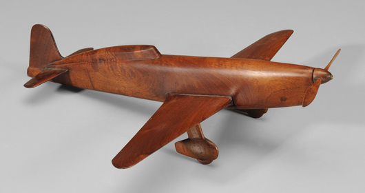 The wingspan on this mahogany air racer prototype is 14 inches, and the propeller diameter is 4¼ inches. The French model, circa 1932, went on to become the ultra-fast Caudron C450. Estimate: $400/$800. Brunk Auctions image.