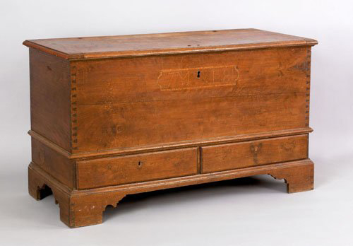 Nondrying oil such as tung oil or linseed oil could undergo a chemical change, eventually turning dark and obscuring the original surface and writing on this Pennsylvania walnut blanket chest. Image courtesy of Pook & Pook Inc. and LiveAuctioneers Archive.