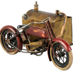 Extremely rare live-steam 'Indian' motorcycle, 8 inches long, believed to have been made by prewar Japanese maker C-K. Sidecar serves as boiler. $8,000-$12,000. Dan Morphy Auctions image.