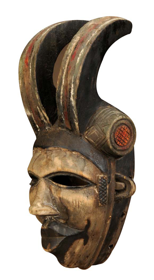 One of a pair of 14-inch-long West African masks. Origin: Nigeria. $300-$500. Dan Morphy Auctions image.