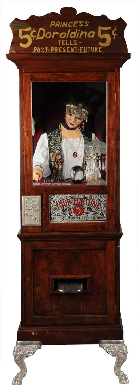 Princess Doraldina Fortune Teller machine, 1928, 73 inches tall. Mystic’s chest moves as though she is breathing, while she moves hand over tarot cards prior to dispensing a fortune. Original and complete. $15,000-$25,000. Dan Morphy Auctions image.