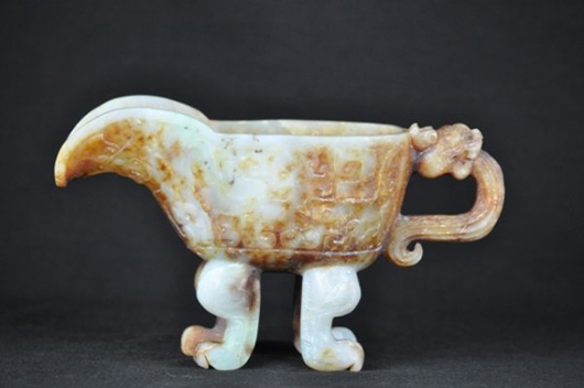 White jade libation cup, Ming Dynasty, 9 inches, estimate: $5,000-$6,000. Image courtesy of Wichita Auction Gallery.