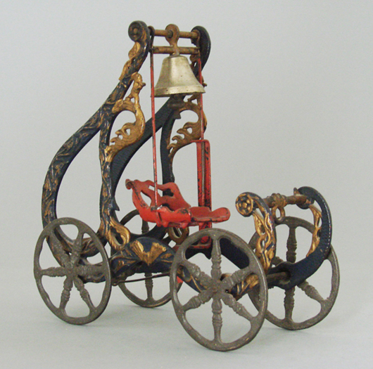 Circa-1890 Ives, Blakeslee & Williams Charity Swing cast-iron bell toy, estimate $12,000-$15,000. RSL Auction Co. image.