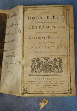 The cover of 'The Holy Bible' printed by Robert Aitken was detached, but the flaw did not deter a rare book dealer from buying the 1782 volume for $78,975.