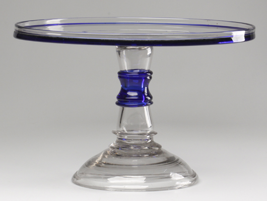 Monumental free-blown salver, colorless and cobalt blue. Probably Bakewell, Pears & Co., Pittsburgh, 1850-1875. Height: 10 inches; diameter: 16 inches. Estimate: $2,000-3,000. Image courtesy Jeffrey S. Evans & Associates.