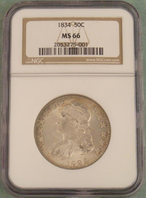 In Mint State 66, this 1834 half dollar requires a starting bid of $15,000. Image courtesy of Universal Live.