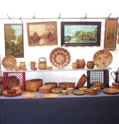 This booth offers a selection of Native American basketwork. Image courtesy of Allman Promotions.