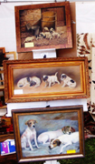A booth at Round Lake offers your choice of antique dog paintings. Image courtesy of Allman Promotions.