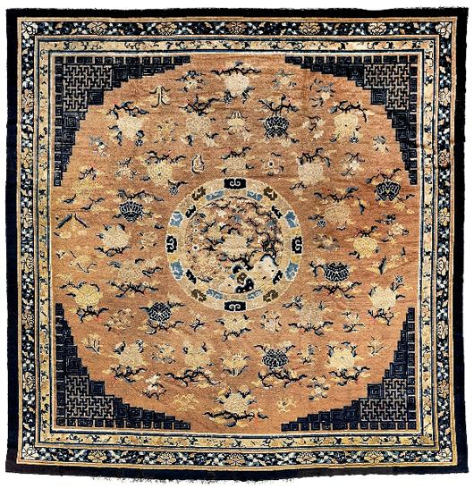 Almost square, this 19th-century Chinese rug with large central medallion was the star rug of the sale at $18,400. Note the multiple Greek key and lattice motifs in the corners. Image courtesy of Brunk Auctions.