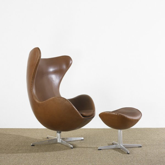 Arne Jacobsen is credited with inventing the Egg chair. Fritz Hansen, Denmark, manufactured this example with ottoman circa 1958. It retains the manufacturer’s decal label on the base. The estimate is $7,000-$9,000. Image courtesy of Wright.