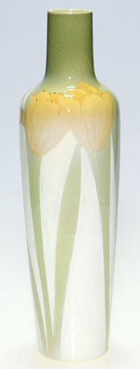 Kataro Shirayamadani decorated this rare Iris glaze vase with Art Nouveau tulips early in his career at Rookwood. The 13 1/8-inch vase is dated 1900 and is estimated at $9,000-$12,000. Image courtesy of the Auctions at Rookwood.