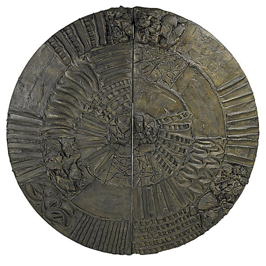 A bronze disc bar with interior cabinet made $13,000 against a $5,000 estimate at Rago in an April 25, 2010 sale. Image courtesy of Rago Arts.