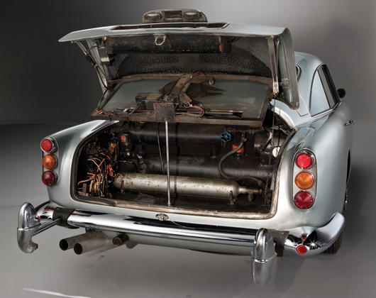 A look inside the boot, or trunk, of James Bond's Aston Martin reveals a morass of intricate wiring connected to the British superspy's many automotive gadgets. Image copyright Shotterz. Car to be auctioned Oct. 27 by RM Auctions.