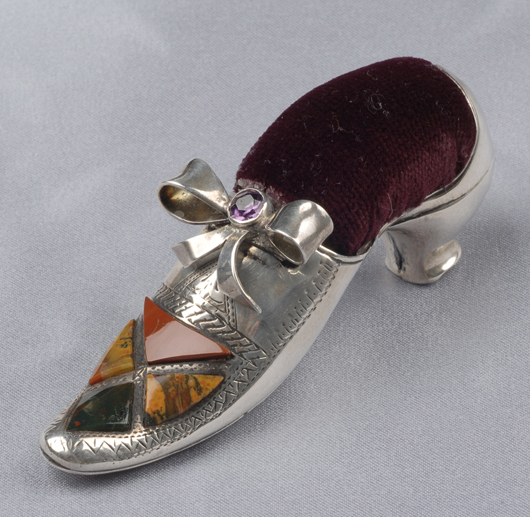 Victorian shoe-form sterling silver and Scottish agate pincushion, Birmingham, 1890-91. Estimate $400-$600. Image courtesy of Skinner Inc.