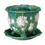 This majolica jardiniere with water lilies is marked 'Minton.' It was made in the late 19th century. The bowl is 9 3/4 inches in diameter and sold for $633 at a Brunk auction in Asheville, N.C.