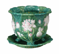 This majolica jardiniere with water lilies is marked 'Minton.' It was made in the late 19th century. The bowl is 9 3/4 inches in diameter and sold for $633 at a Brunk auction in Asheville, N.C.
