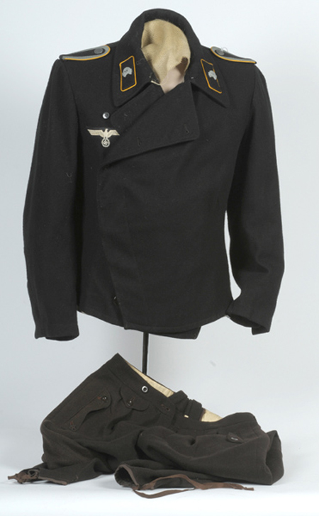 In excellent condition this WWII Nazi German army panzer wrap piped for cavalry includes trousers. The uniform has a $4,000-$6,000 estimate. Image courtesy of Cowan’s Auctions Inc.