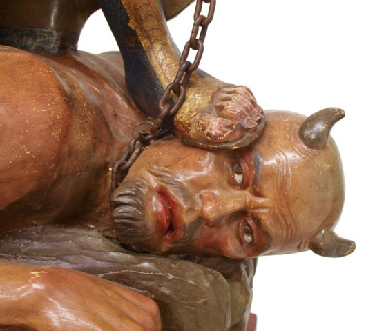 Closeup of Lucifer's head from Agustin Parra Echaurri's 9ft. 5in. statue of St. Michael reveals the artist's great talent for detail and expression. Image courtesy of Austin Auction Gallery.