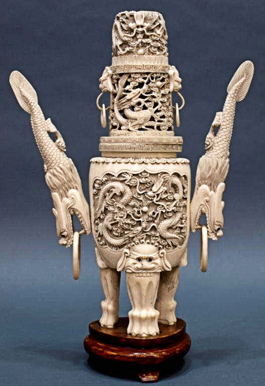 An extensive selection of carved Chinese and Japanese ivories will be auctioned. Shown here is a tripodal censer with dragon motif. Austin Auction Gallery image.