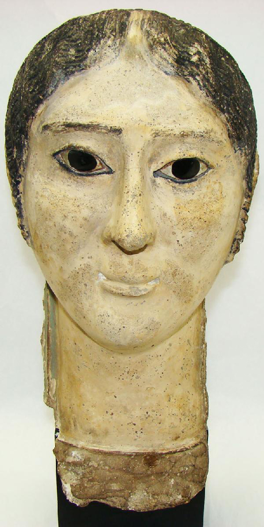 Subtle facial features and serene expression grace this 2000-year-old gesso "mummy" mask of a woman from Egypt. The finely crafted mask, which measures 12 inches by 6 inches, is estimated at $8,000-$10,000. Image courtesy of Malter Galleries Inc.