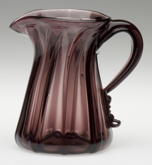 Pillar-molded cream pitcher in dull amethyst, 1850-1870, Mackle Collection, $5,750. Image courtesy Jeffrey S. Evans & Associates.