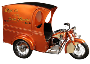 "Say it with Flowers" Indian pedal motorcycle, 76 inches long, made late 1950s to 1960 as part of a carousel ride and later customized. One of a kind display piece. Estimate $7,500-$9,500. Morphy Auctions image.