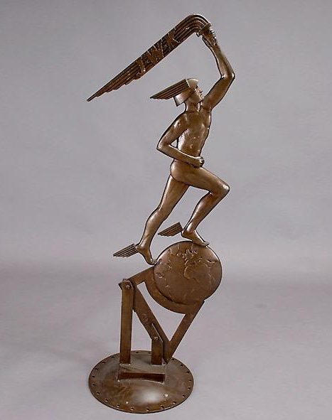 Standing 64 inches tall is this  Art Deco figure of Mercury holding a banner marked "J.W.K." This unusual piece of advertising has a $4,000-$6,000 estimate. Image courtesy of Michaan’s Auctions.