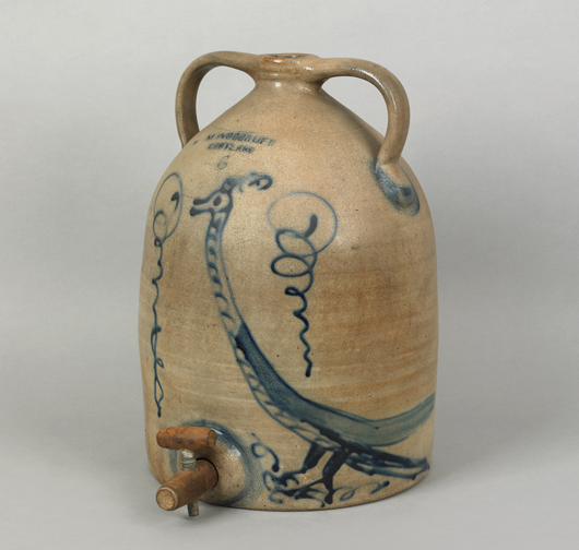 Stoneware collectors crave unusual designs. This 6-gallon water jug, marked ‘M.Woodruff Cortland,’ has a lively goony bird. It sold for $48,800. Courtesy Pook & Pook.