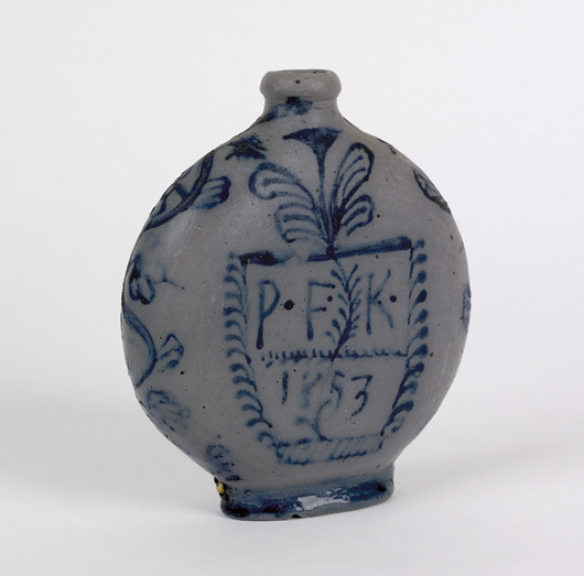A hip flask with the owners initials, dated 1853 and decorated with flowers, brought $17,720 in a September 2007 sale rich in stoneware. Courtesy Pook & Pook.
