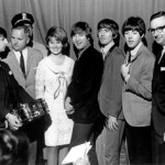 Ringo Starr accepting the gold snare drum in 1964 from William F. Ludwig, Jr., president of Ludwig Drum Company (second from left), as his daughter Brooke, Ludwig's director of marketing R. L. Schory (far right), and the other Beatles (John Lennon, George Harrison, and Paul McCartney) look on. Photo: Ludwig Industries.
