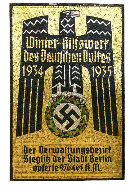 The official mosaic made for the grand opening of the Nazi Germany’s Winter Help Work Program is signed by the firm of August Wagner on one of the tiles. Image courtesy of Affiliated Auctions & Realty LLC.