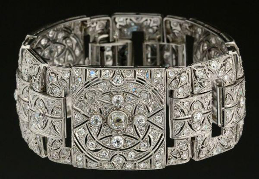 Covered in diamonds weighing a total of 16.2 carats, this Art Deco platinum bracelet in very good condition carries a $12,000-$16,000 estimate. Image courtesy of Affiliated Auctions & Realty LLC.