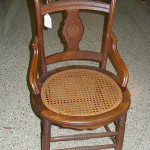 The material in the seat of this late 19th-century chair is cane, not cain, not wicker, not even wick.