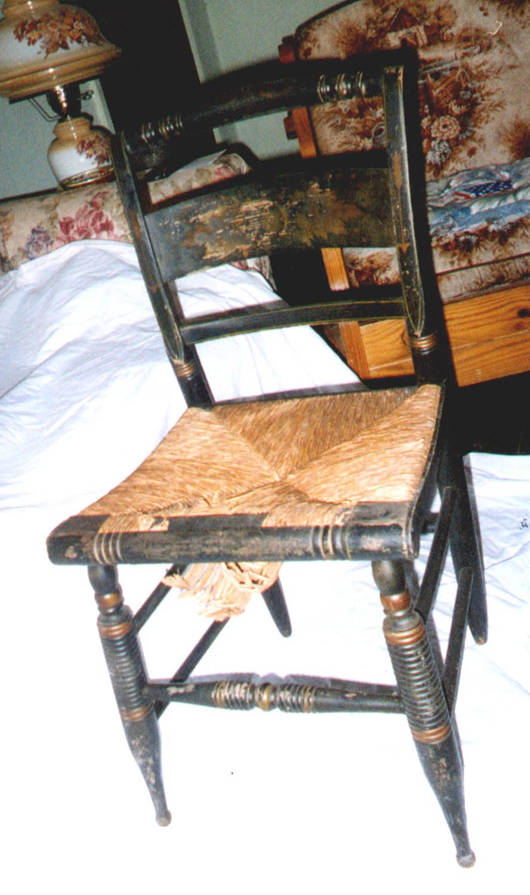 This Hitchcock chair from the 1830s has a natural cattail rush seat, not rusher, not Russia.