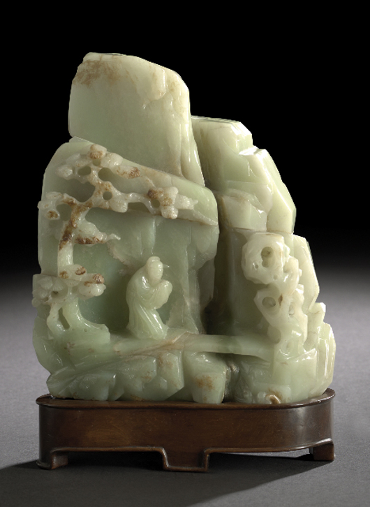 Made for a scholar's desk, this pale green nephrite carving of a mountain scene sold for $16,800 last fall at New Orleans Auction Galleries. Courtesy New Orleans Auction Galleries