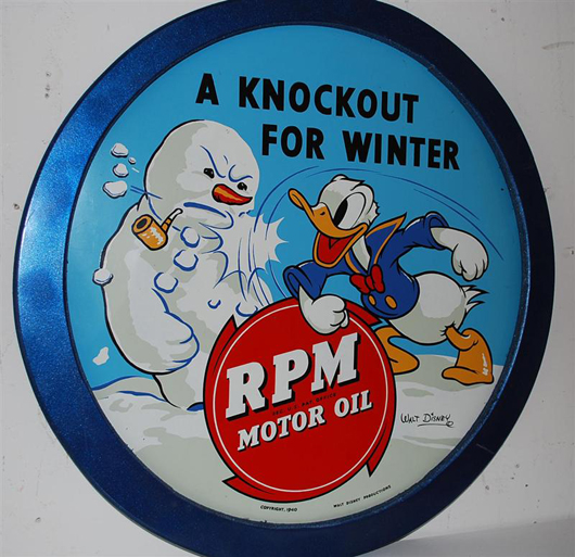 RPM Motor Oil "A Real Knockout For Winter" single-sided tin sign with Donald Duck graphic. Image courtesy Matthews Auctions. 