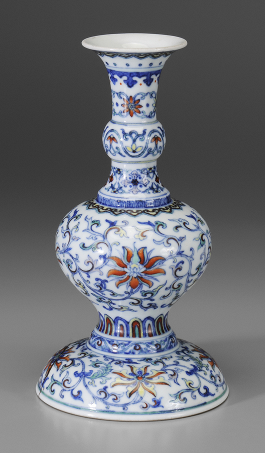 Chinese doucai vases are underglazed, glazed, fired at high temperatures, colored again and fired a second time at lower temperatures. The 11-inch doucai vase with Qianlong marks sold for $41,400 (est. $600-$1,200).  
