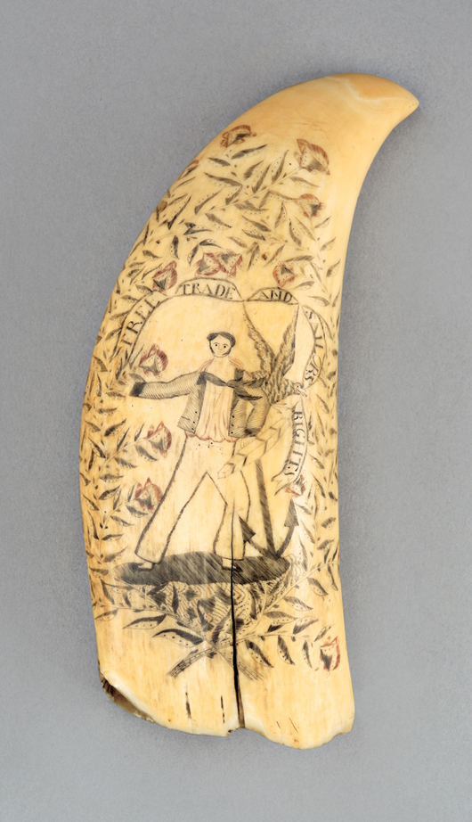 Scrimshaw whale's tooth, 19th century, one side depicting a sailor and anchor amidst flowering branches, an eagle in flight grasping a banner inscribed with "FREE TRADE AND SAILORS RIGHTS." Reverse depicts a romantic couple. Length 7 inches. Estimate $4,000-6,000. Image courtesy of Skinner Inc.